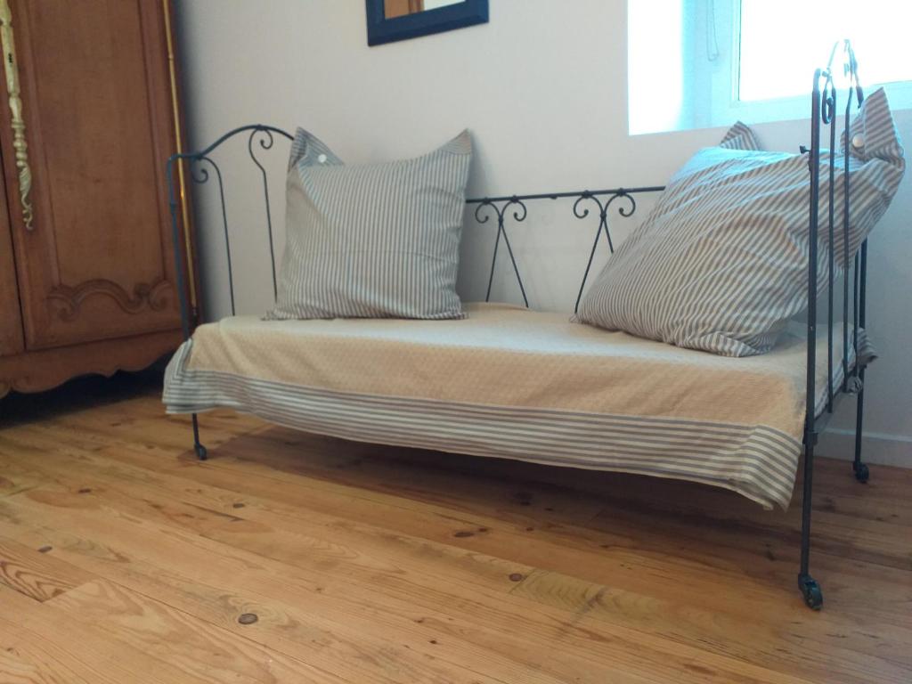 Postel nebo postele na pokoji v ubytování Charmy