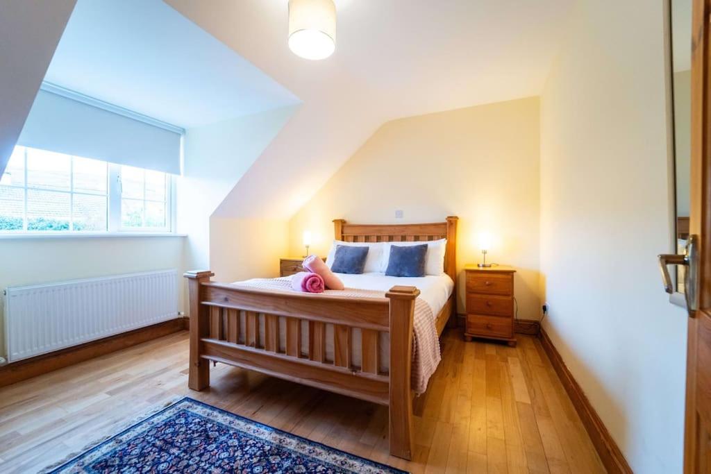 Postel nebo postele na pokoji v ubytování Cluain Dara House