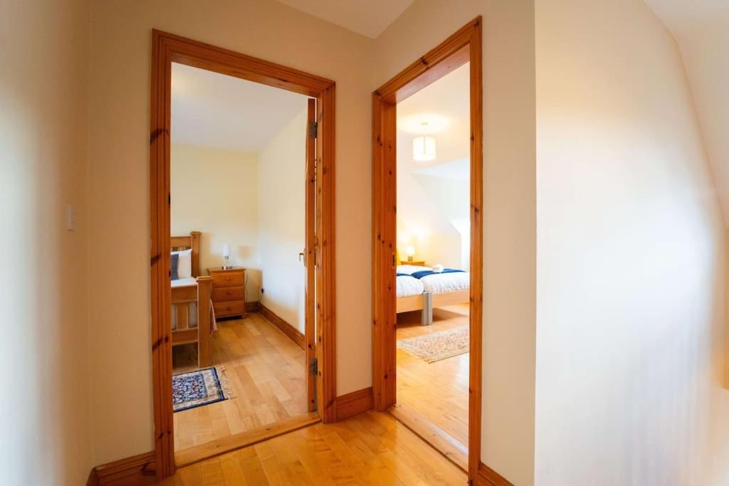 Postel nebo postele na pokoji v ubytování Cluain Dara House