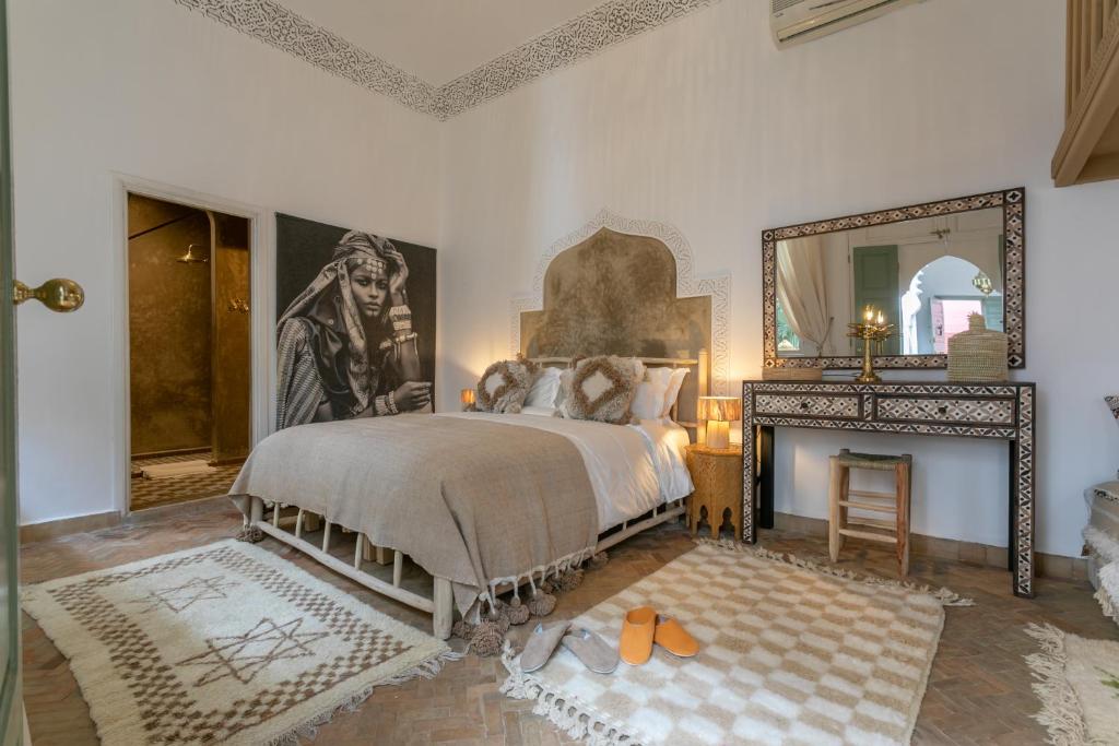Postel nebo postele na pokoji v ubytování Riad Zeitoun Palace