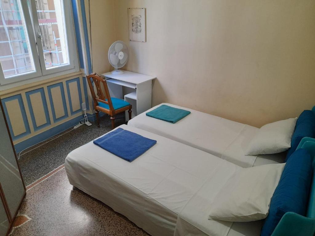 Postel nebo postele na pokoji v ubytování Le Stanze del Notaio