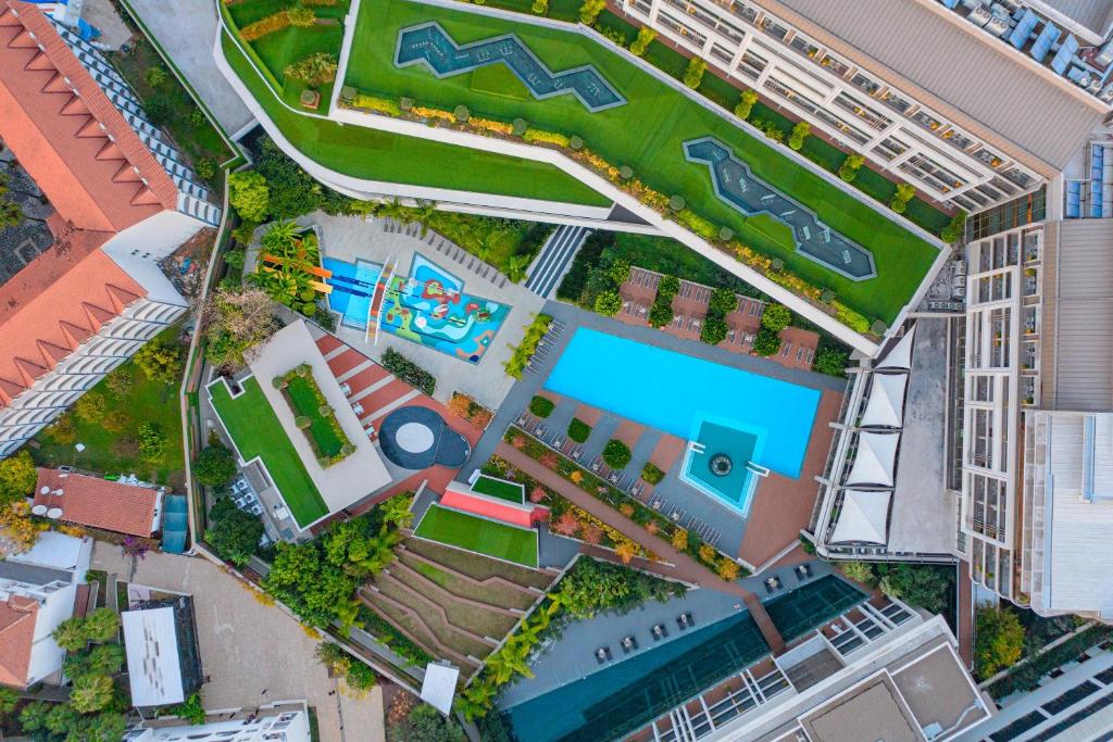 an overhead view of a building with a pool at The Sense Deluxe in Side