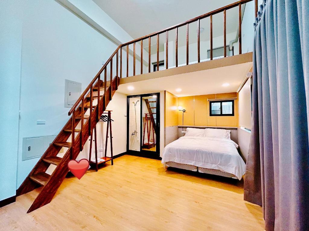 Postel nebo postele na pokoji v ubytování Xianwang Homestay