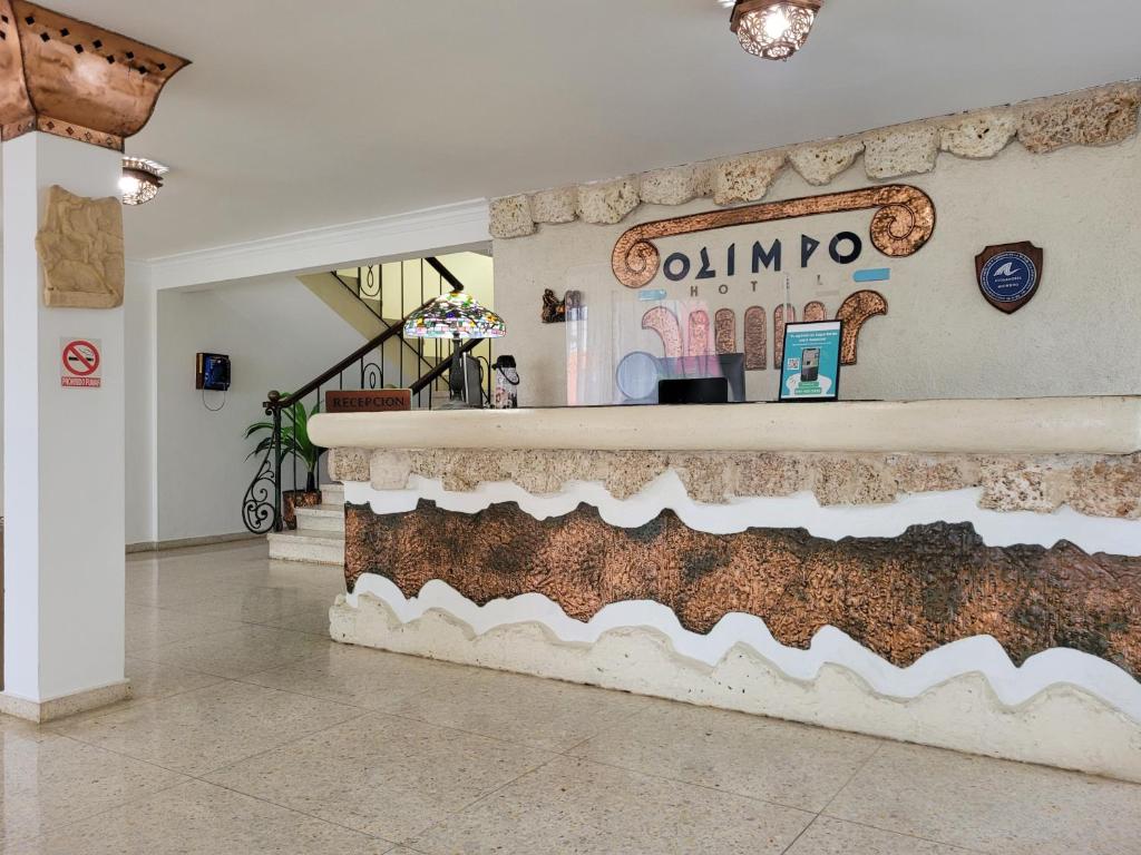 הלובי או אזור הקבלה ב-Hotel Olimpo