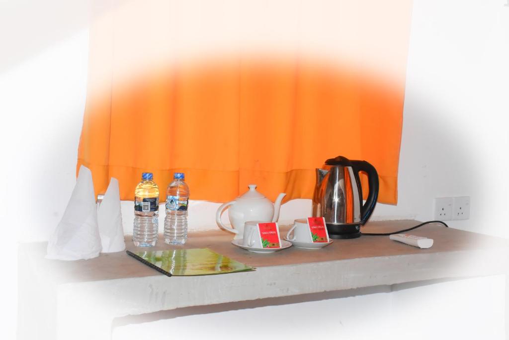 Příslušenství pro přípravu čaje a kávy v ubytování Sunwin River Hotel