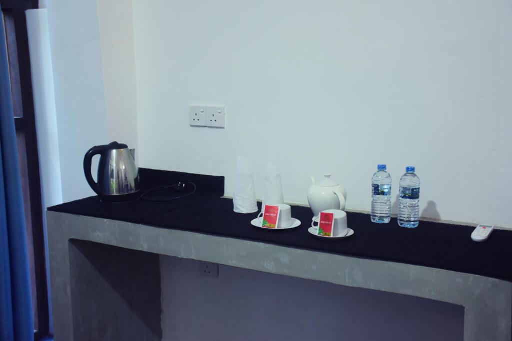 Příslušenství pro přípravu čaje a kávy v ubytování Sunwin River Hotel