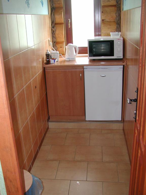 Kuchyň nebo kuchyňský kout v ubytování Chata - Srub Kašparáci