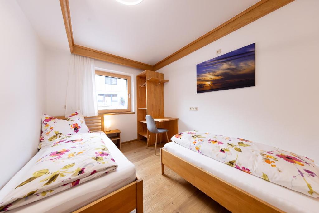 Postel nebo postele na pokoji v ubytování Ferienwohnung Gipfelreich