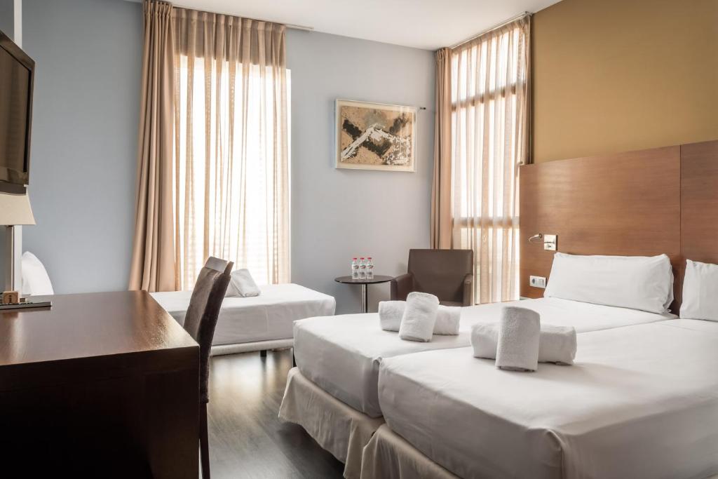 
Triple Room (2 Adults + 1 Child)
