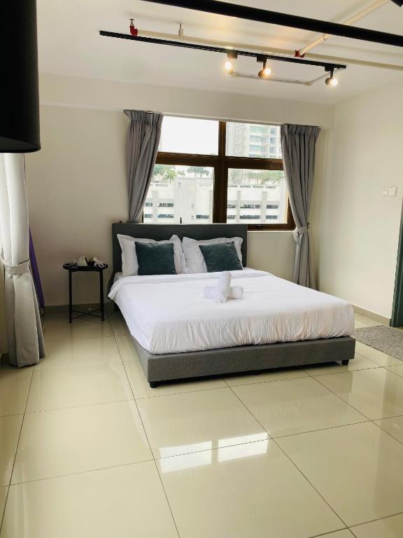 Katil atau katil-katil dalam bilik di Pinnacle Duplex@6Pax-5m Walk to Paradigm Mall+WIFI