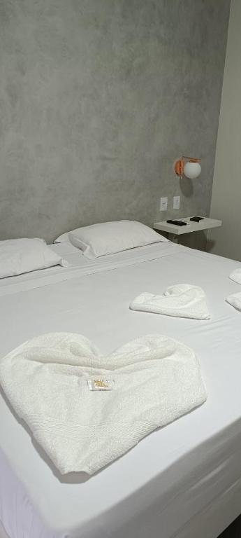 Postel nebo postele na pokoji v ubytování RADAR PÁLACE HOTEL
