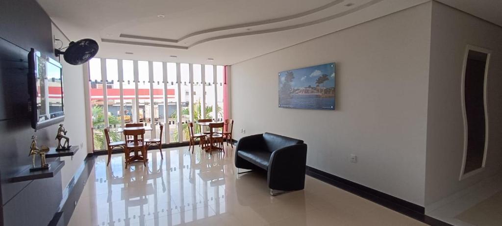 TV a/nebo společenská místnost v ubytování RADAR PÁLACE HOTEL