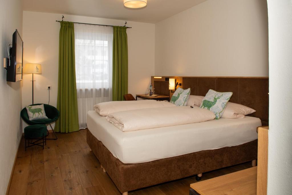 Postel nebo postele na pokoji v ubytování Hotel Bockmaier
