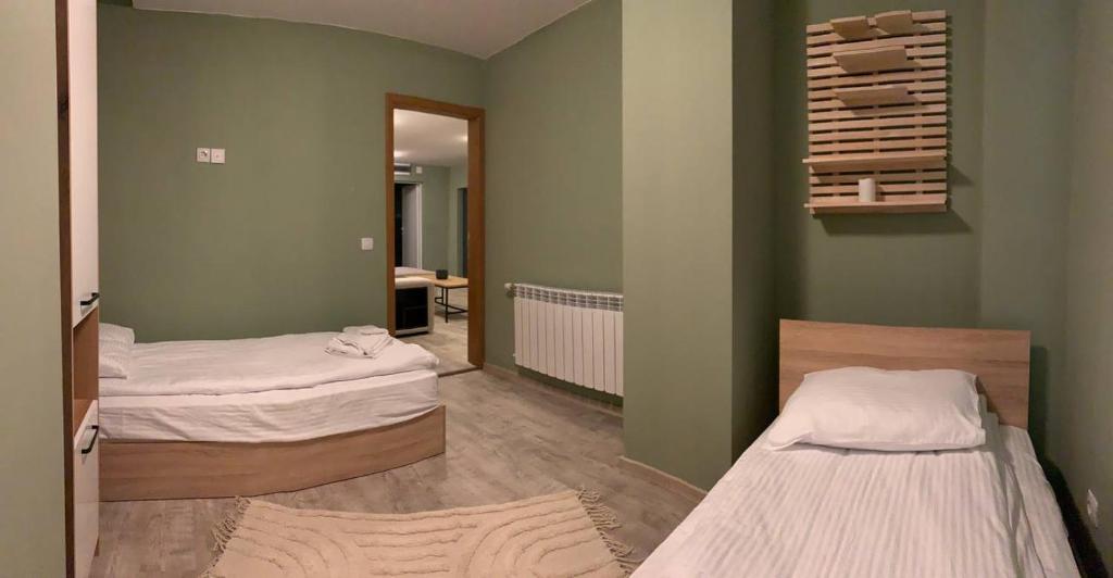 Postel nebo postele na pokoji v ubytování Olive Apartment with terrace B100 in Grand Resort Pamporovo