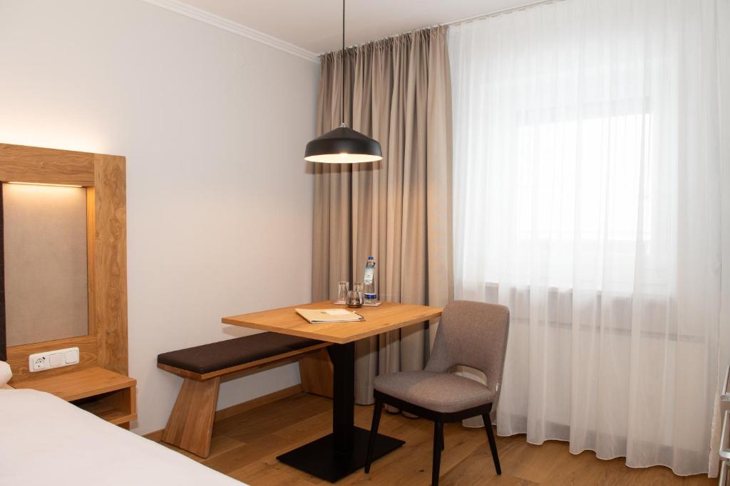 Postel nebo postele na pokoji v ubytování Hotel Bockmaier