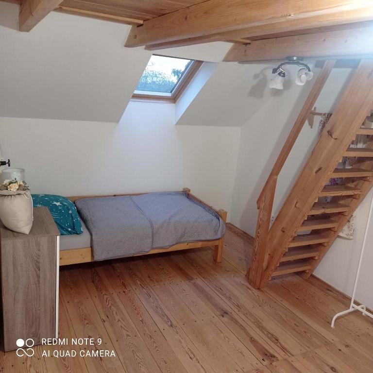 Postel nebo postele na pokoji v ubytování Apartmán Chroustkov