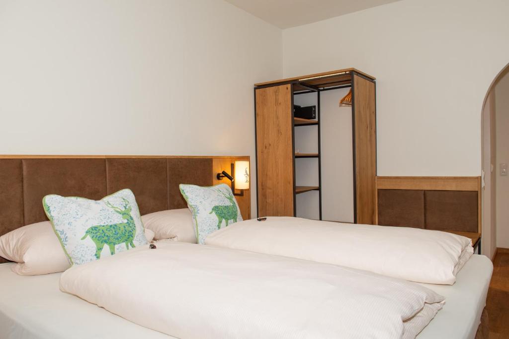 Postel nebo postele na pokoji v ubytování Hotel Bockmaier