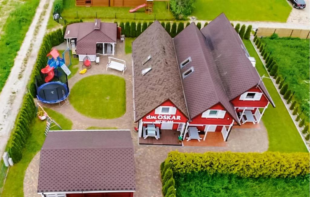 an overhead view of a model house with a garage at Lovely Home In Chlopy With Kitchen in Chłopy