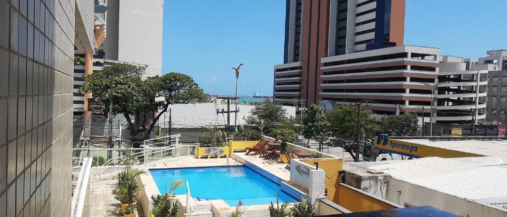 a view of a swimming pool in a city at Via Venetto FEIRINHA in Fortaleza