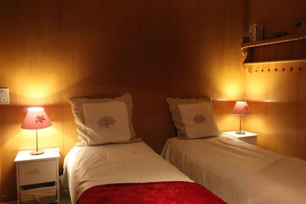 Postel nebo postele na pokoji v ubytování Chalet Privé avec vue imprenable sur les alpes