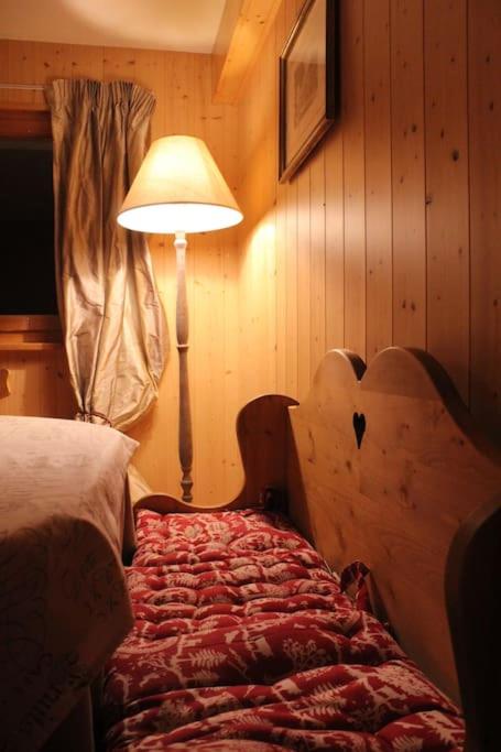 Postel nebo postele na pokoji v ubytování Chalet Privé avec vue imprenable sur les alpes