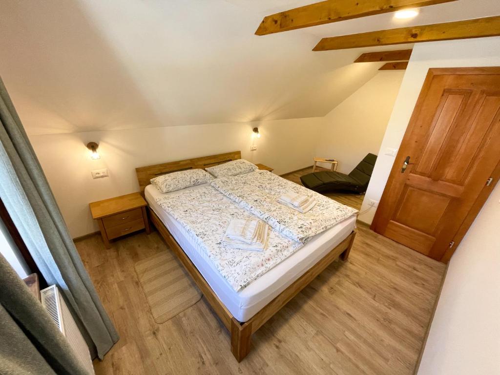 Postel nebo postele na pokoji v ubytování Apartment House Prezlc
