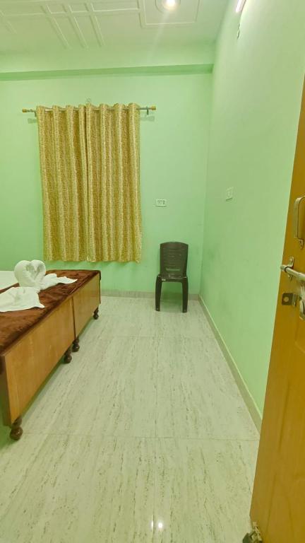 Voodi või voodid majutusasutuse ARJUN PAYING GUEST HOUSE toas