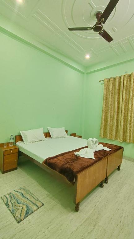 Voodi või voodid majutusasutuse ARJUN PAYING GUEST HOUSE toas