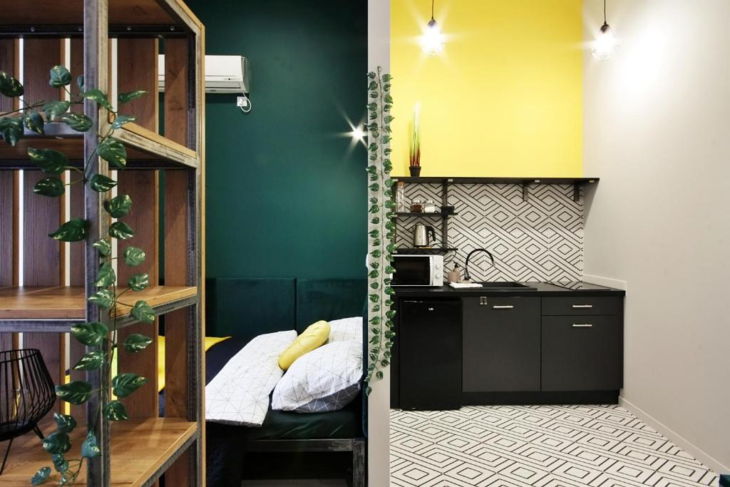 O bucătărie sau chicinetă la Apartamenty Matejki