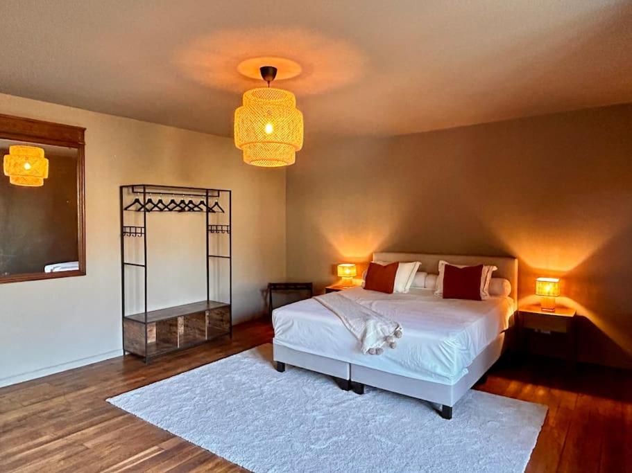 Postel nebo postele na pokoji v ubytování Manoir Nestor - Chairière