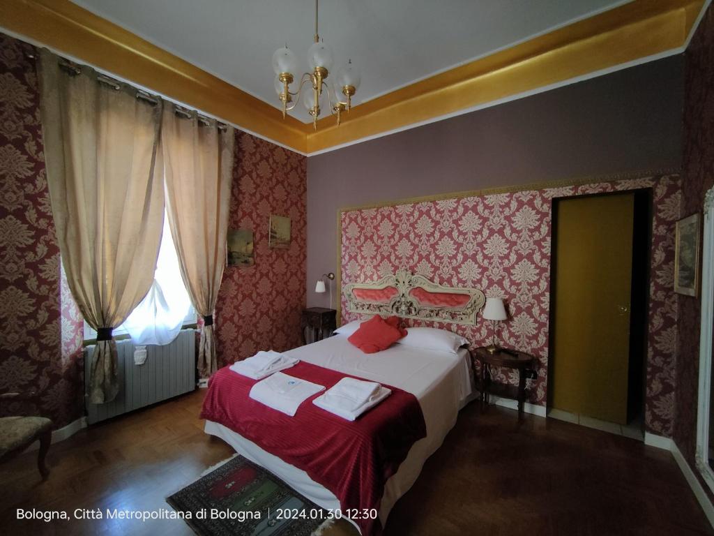 Łóżko lub łóżka w pokoju w obiekcie B&B Villa Rivabella