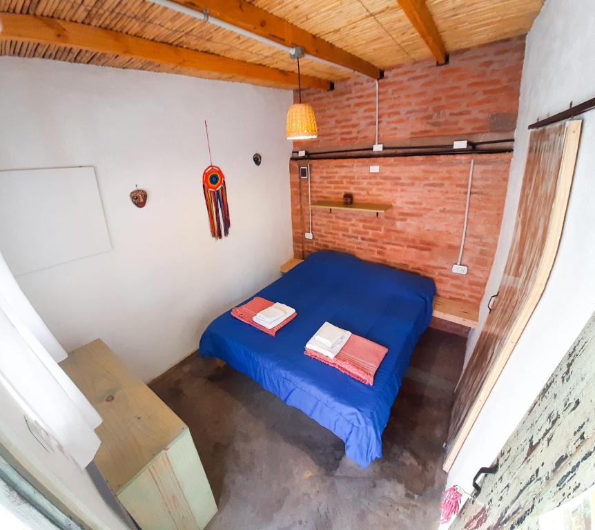 Postel nebo postele na pokoji v ubytování Cielito Lindo