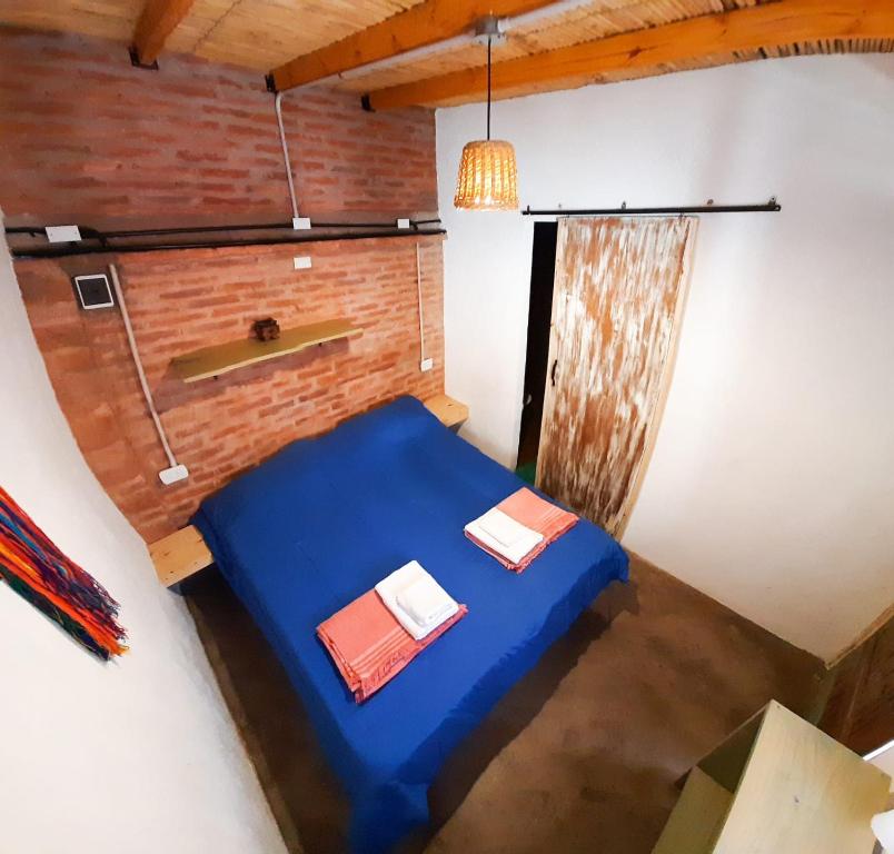 Postel nebo postele na pokoji v ubytování Cielito Lindo