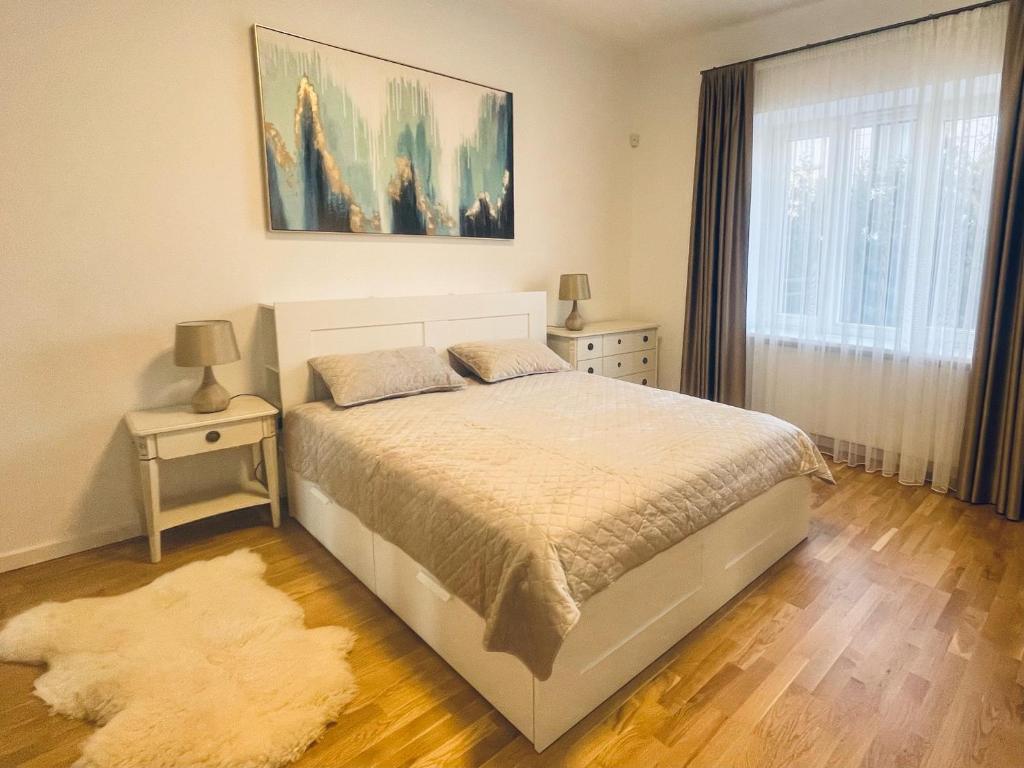 Lova arba lovos apgyvendinimo įstaigoje Luxury Central Apartment Easy Kaunas