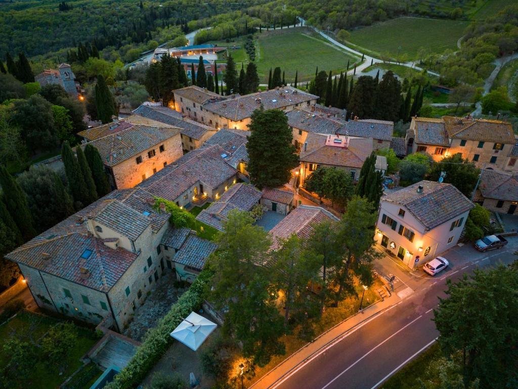 an aerial view of a large house with a street at Castello di Fonterutoli Wine Resort in Castellina in Chianti