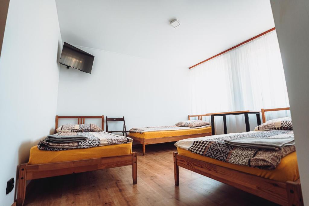 Postel nebo postele na pokoji v ubytování Kalwados