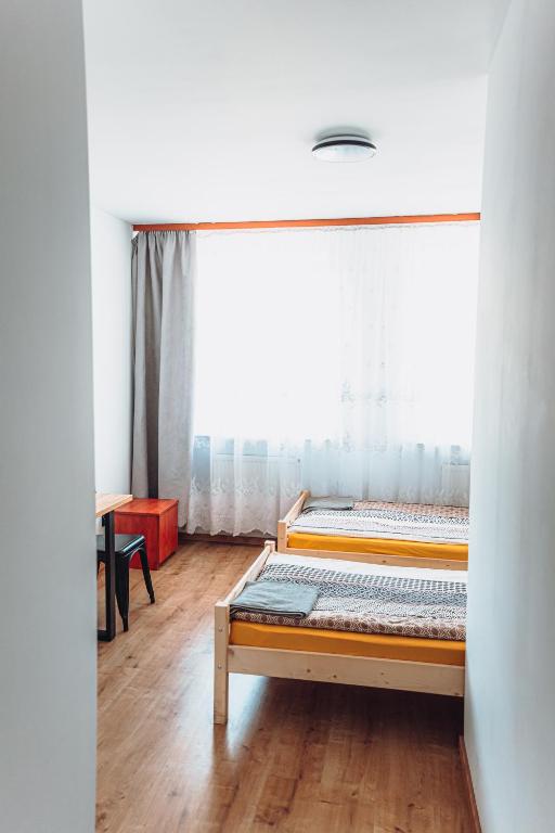 Postel nebo postele na pokoji v ubytování Kalwados