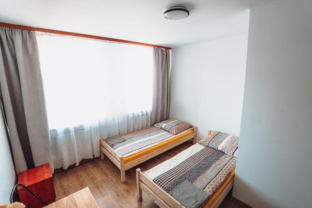 Postel nebo postele na pokoji v ubytování Kalwados
