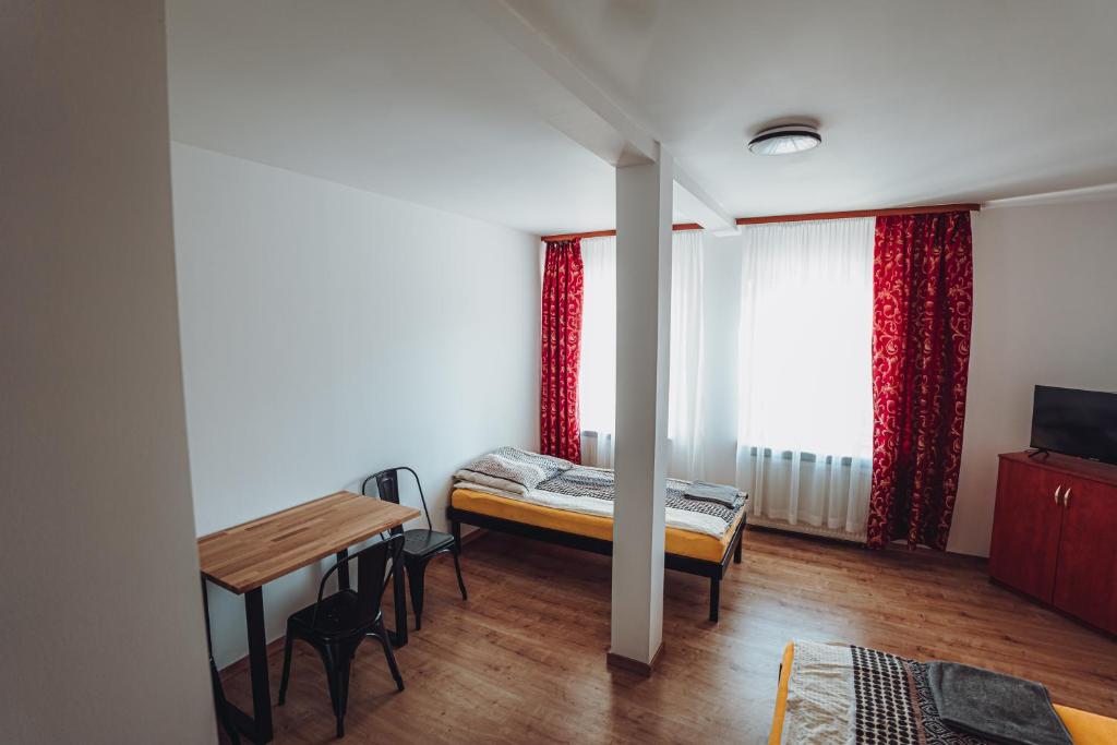 Postel nebo postele na pokoji v ubytování Kalwados