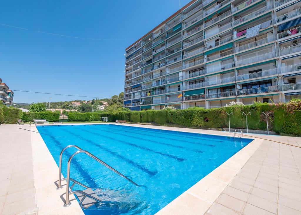 Bazén v ubytovaní HomeHolidaysRentals Vall III alebo v jeho blízkosti