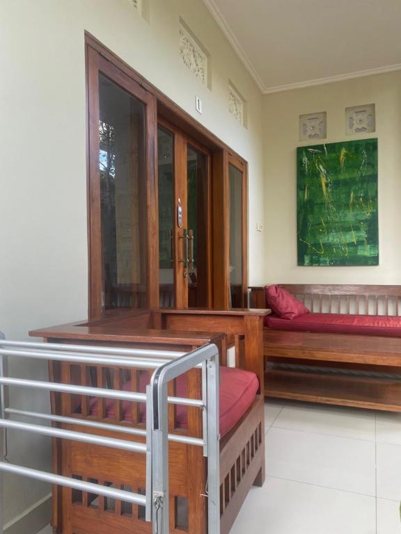 Letto o letti in una camera di GUS ARDITYA HOMESTAY