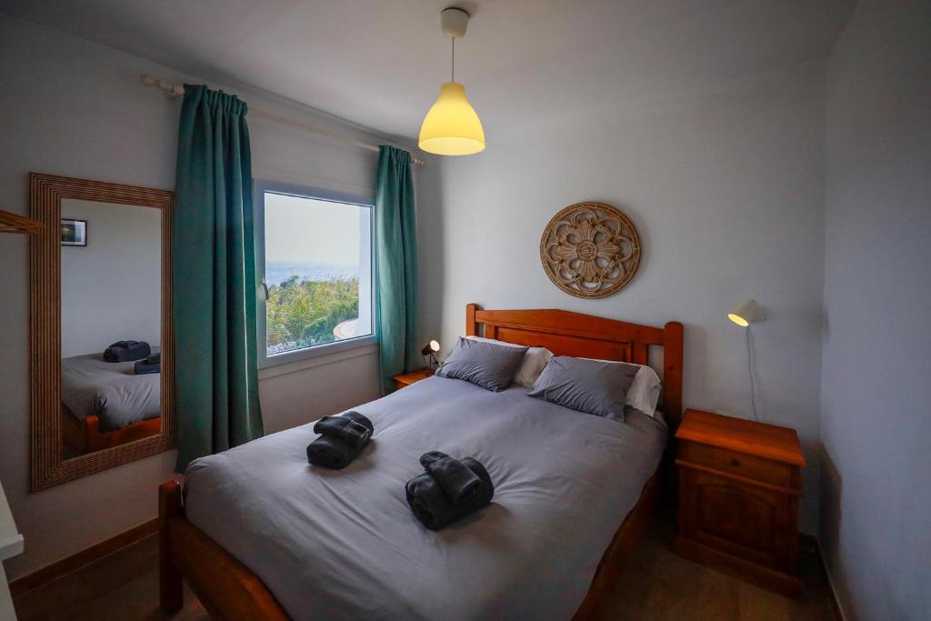 Posteľ alebo postele v izbe v ubytovaní Beach Front Villa Amazing Views