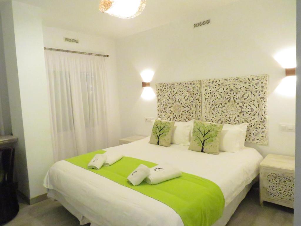 Postel nebo postele na pokoji v ubytování Lua Hotel Boutique