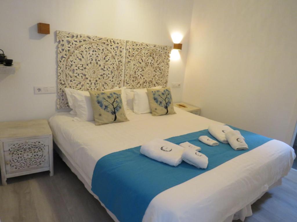 Postel nebo postele na pokoji v ubytování Lua Hotel Boutique