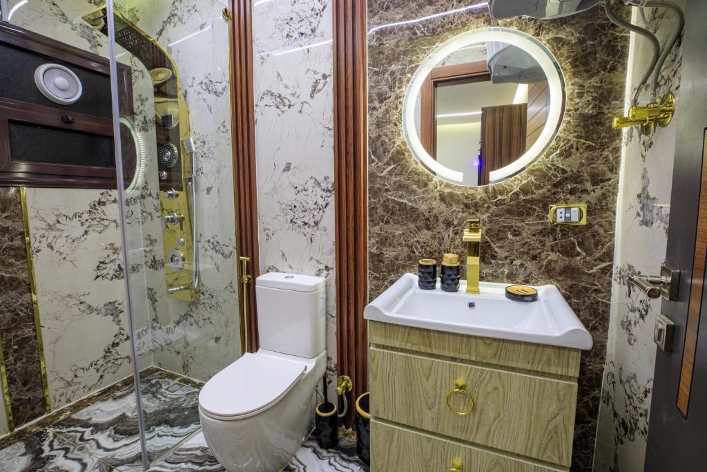 Koupelna v ubytování Piccolo Mondo Boutique Hotel