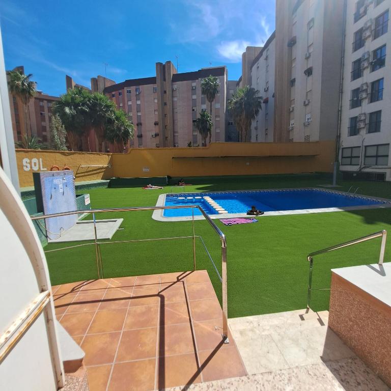a view of a pool in the middle of a building at Apartamento Fiesta Sol in Benidorm