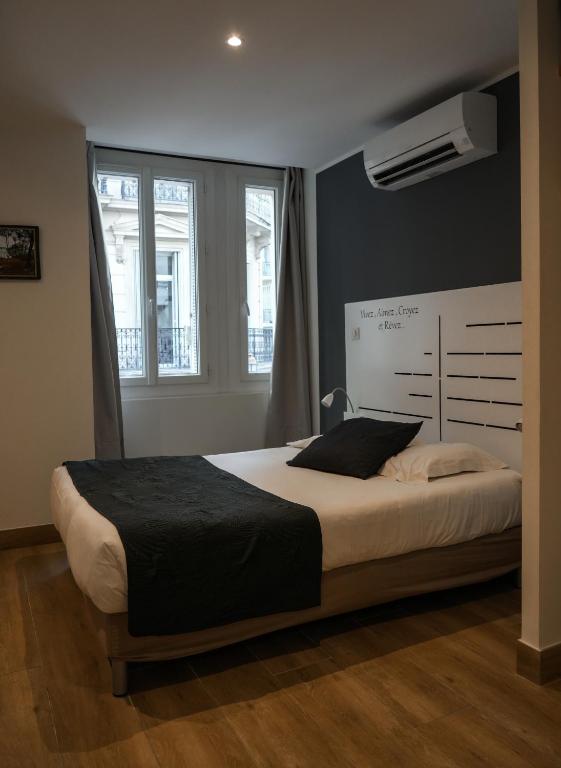 Postel nebo postele na pokoji v ubytování Celenya Hôtel