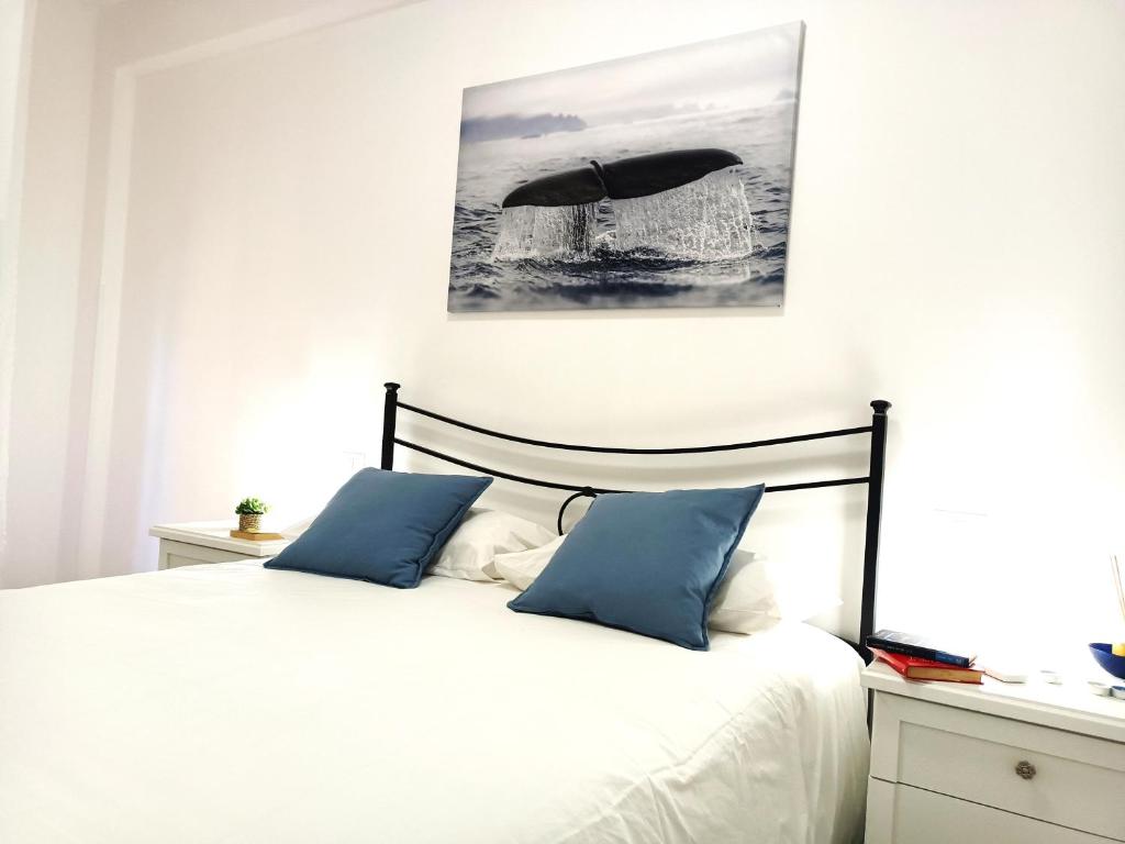 Tempat tidur dalam kamar di DanysHome Circe vista mare