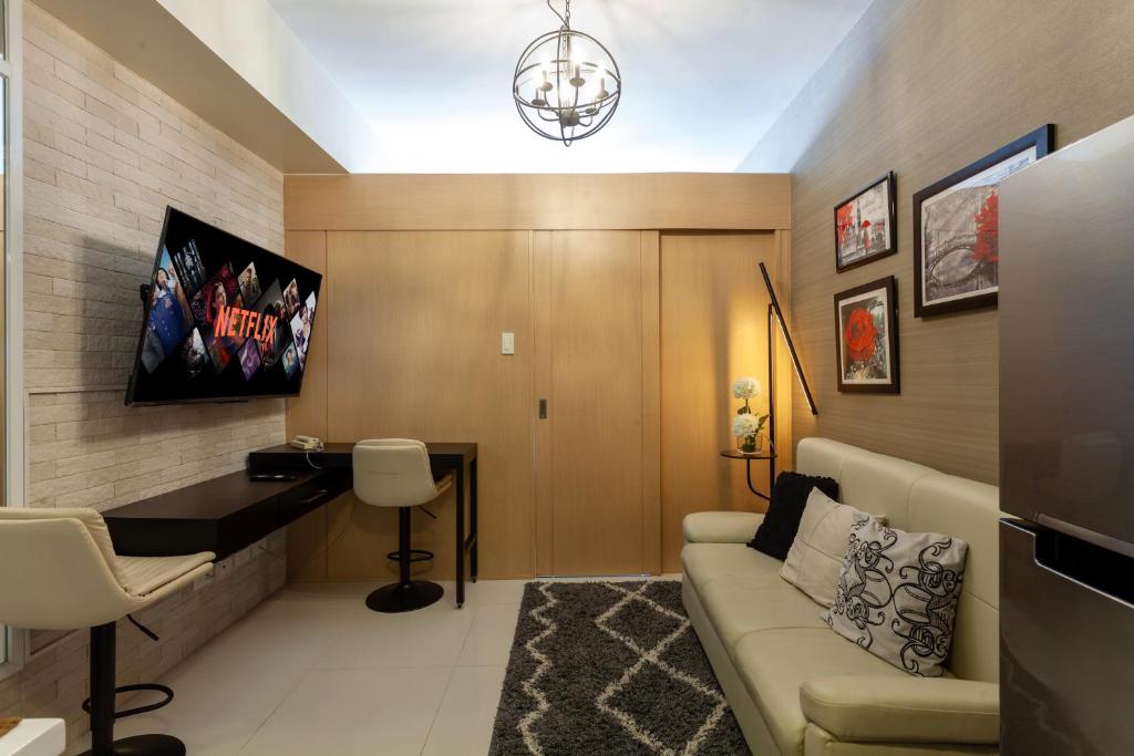 TV a/nebo společenská místnost v ubytování Room 2222 - Tagaytay, PH