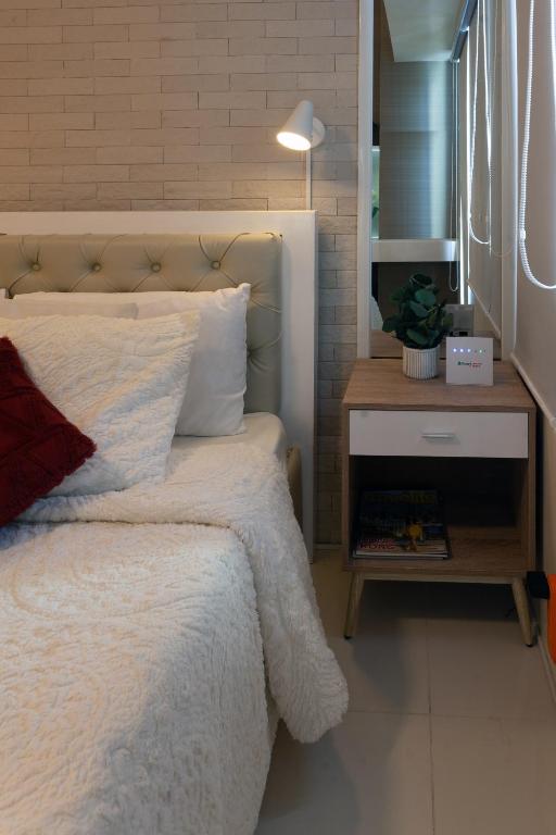 Postel nebo postele na pokoji v ubytování Room 2222 - Tagaytay, PH